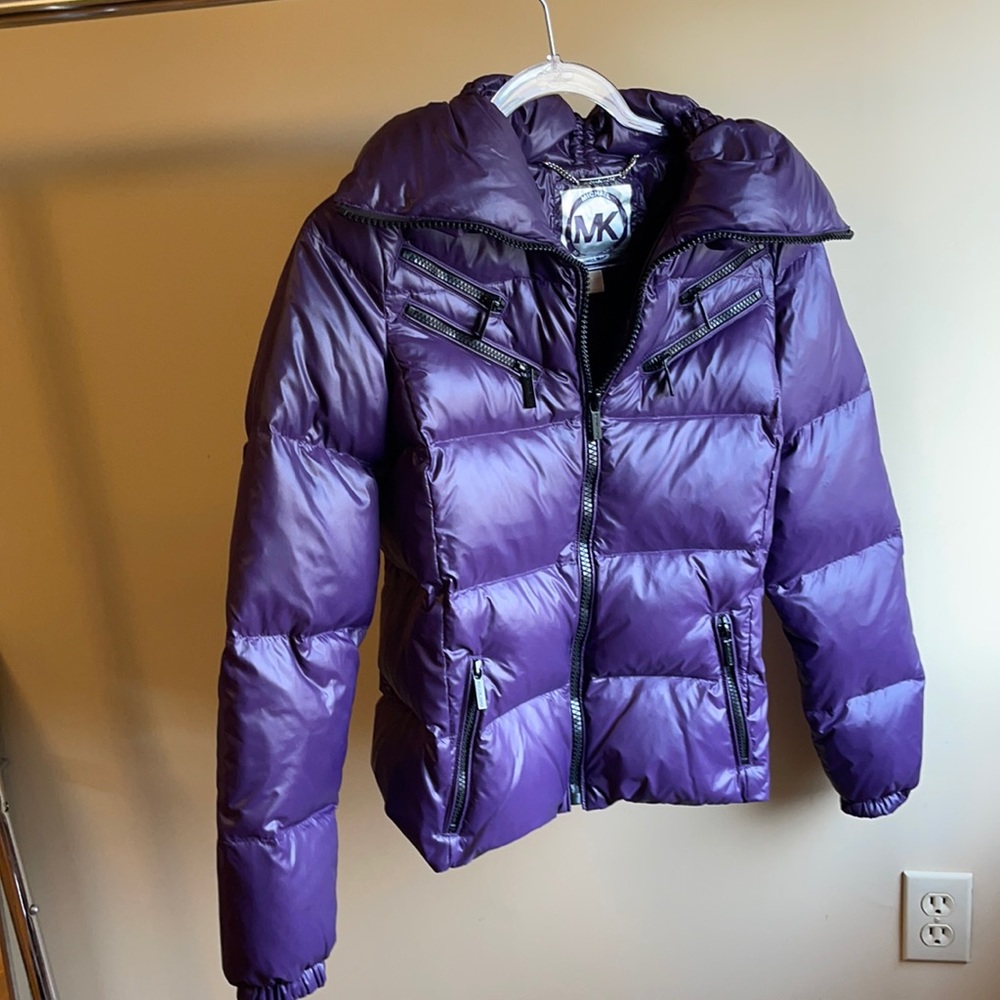 Purple Michael Kors puffer jacket.